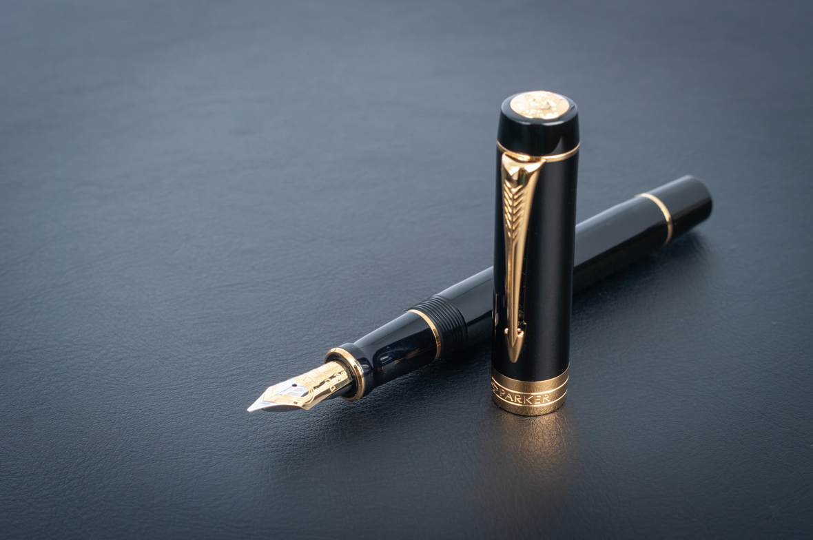паркер с золотым пером