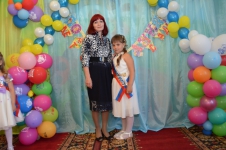 С внучкой на выускном